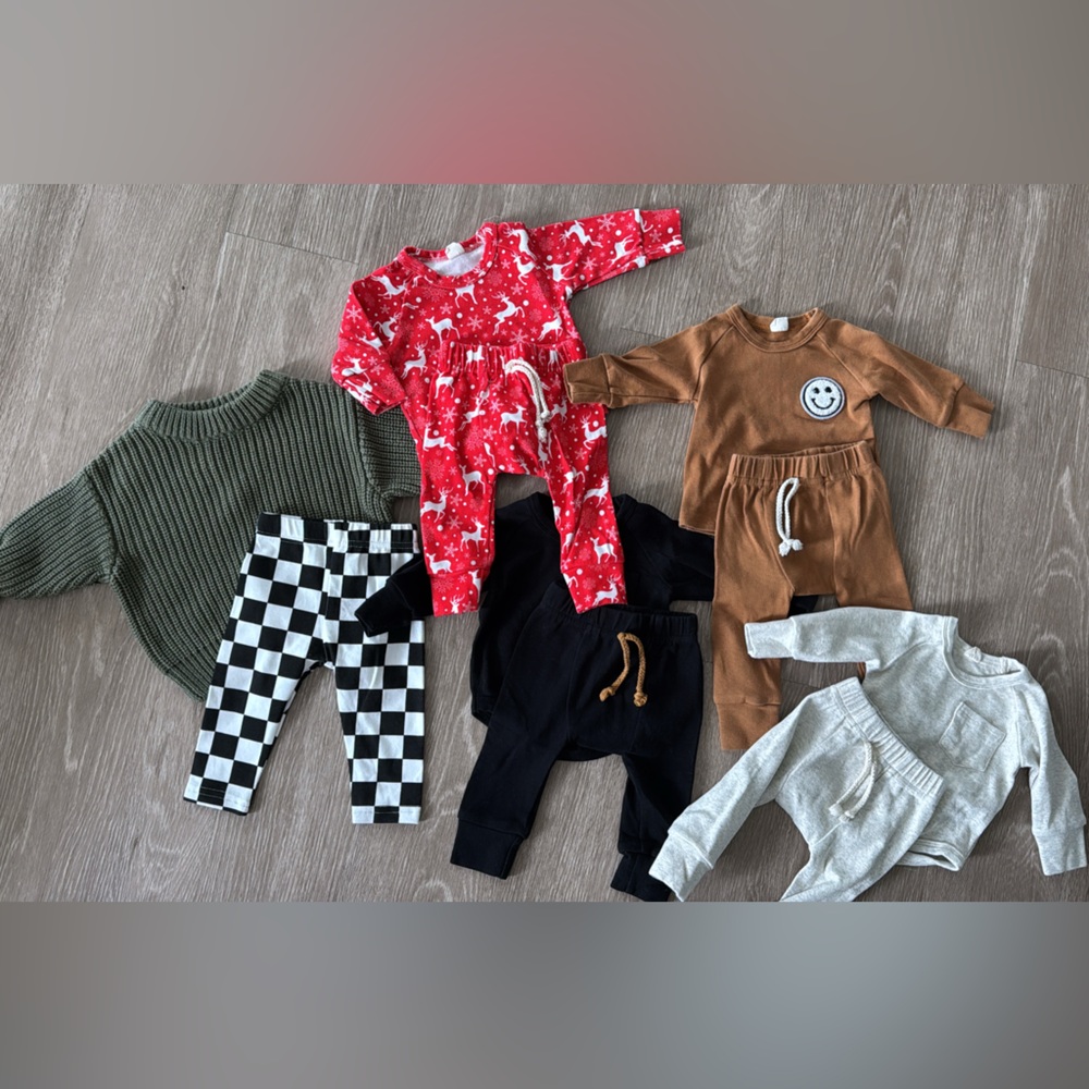 LUCKY PANDA KIDS 
size 0-3months 
sweater is 0-6months